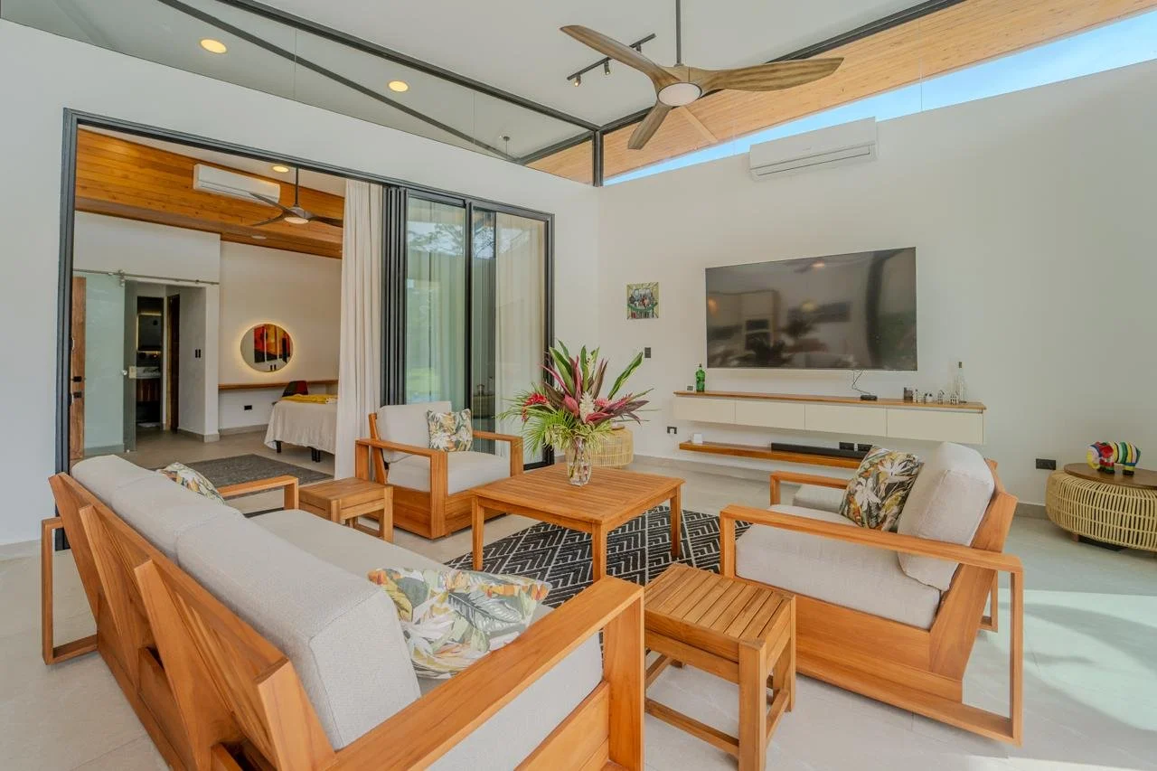 Living room of a residence at Los Delfines opening onto the terrace